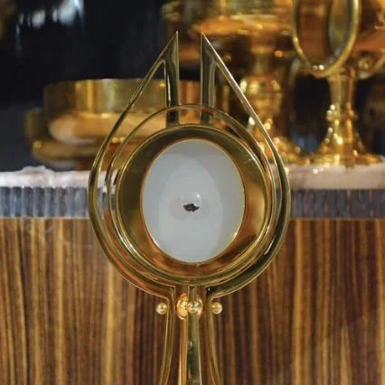 Golden monstrance holding the Blessed Sacrament — Catholic Family Newsletter