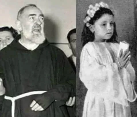 Historic photograph of Saint Padre Pio standing beside a young girl, showing spiritual guidance and faith