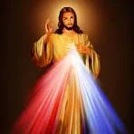 Divine Mercy Jesus with rays of red and white light — Catholic Family Newsletter.