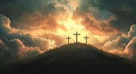 Three crosses on Calvary at sunset, symbol of Christ’s sacrifice — Catholic Family Newsletter.