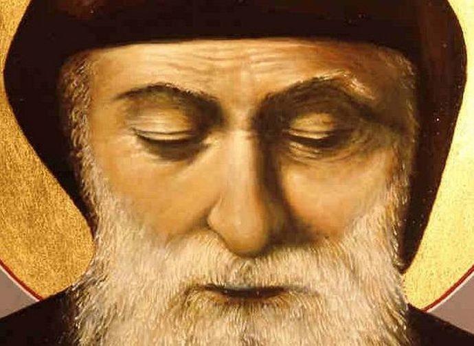 Saint Padre Pio with eyes closed in prayer — Catholic Family Newsletter.